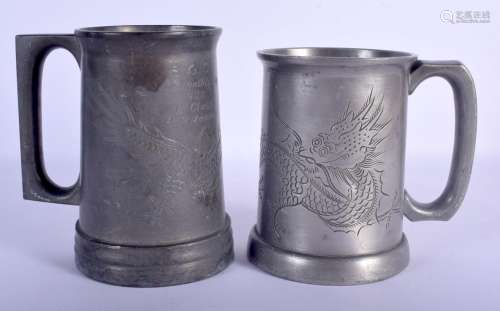 A NEAR PAIR OF EARLY 20TH CENTURY CHINESE PEWTER TANKARDS by...