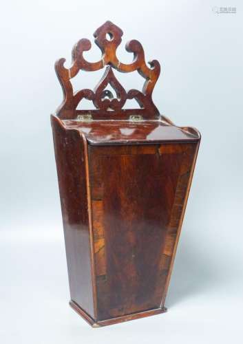 A George III mahogany and rosewood banded hanging candle box...