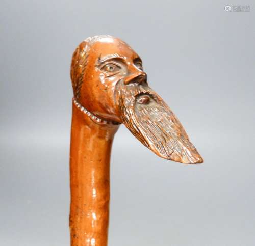 A 19th century carved briar walking stick