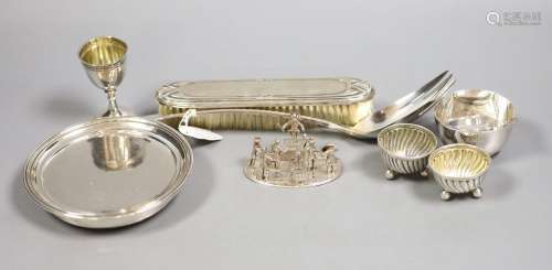 A small group of silver and white metal items including a Wi...