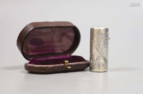 A cased late Victorian silver cylindrical scent bottle, with...