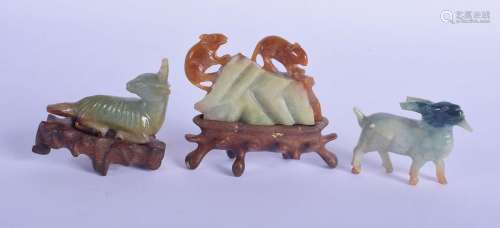 AN EARLY 20TH CENTURY CHINESE CARVED TWO TONE JADE FIGURE OF...