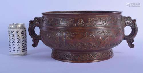 A LARGE TWIN HANDLED CHINESE BRONZE CENSER 20th Century, dec...