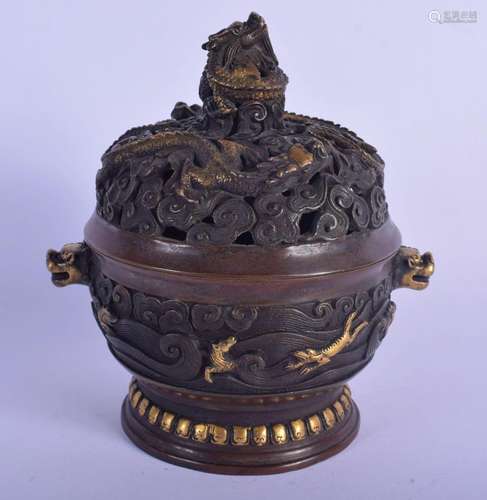 A CHINESE TWIN HANDLED BRONZE CENSER AND COVER 20th Century,...