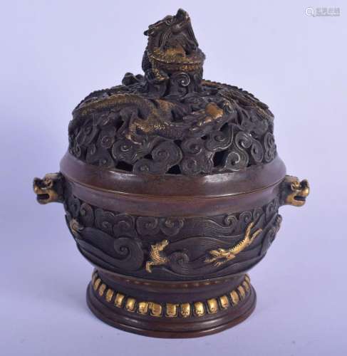 A CHINESE TWIN HANDLED BRONZE CENSER AND COVER 20th Century,...