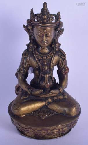 AN 18TH/19TH CENTURY CHINESE TIBETAN FIGURE OF A SEATED BUDD...
