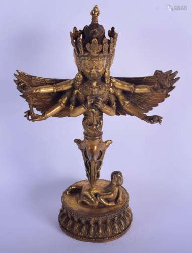 A CHINESE TIBETAN BRONZE FIGURE OF A WINGED GOD 20th Century...