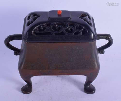 A CHINESE TWIN HANDLED BRONZE CENSER AND COVER 20th Century,...