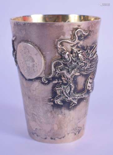 A LATE 19TH CENTURY CHINESE EXPORT SILVER DRAGON BEAKER. 83 ...