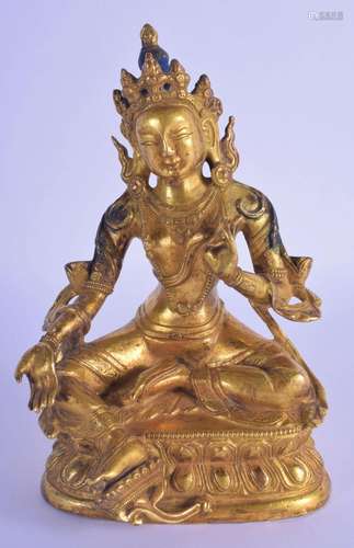 AN 18TH/19TH CENTURY CHINESE TIBETAN GILT BRONZE FIGURE OF A...