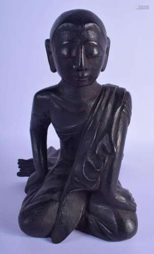 A LATE 19TH CENTURY THAI LACQUERED WOOD FIGURE OF A BUDDHA. ...