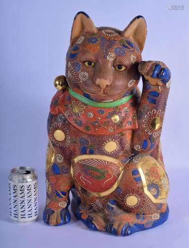 A LARGE JAPANESE TAISHO SATSUMA POTTERY CAT embellished in f...