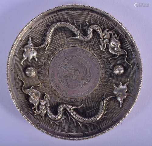 A CHINESE WHITE METAL DRAGON DISH 20th Century. 107 grams. 9...