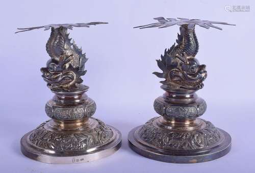 A RARE PAIR OF 19TH CENTURY CHINESE EXPORT SILVER DRAGON TAZ...