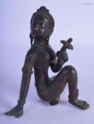 A 19TH CENTURY INDIAN BRONZE FIGURE OF A SEATED FEMALE model...