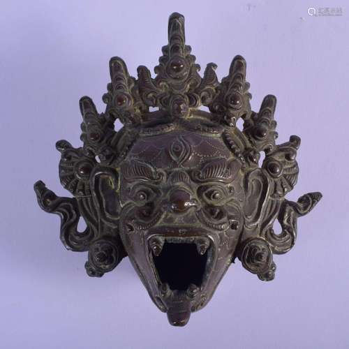 AN 18TH/19TH CENTURY TIBETAN BRONZE MASK HEAD BRUSH WASHER m...