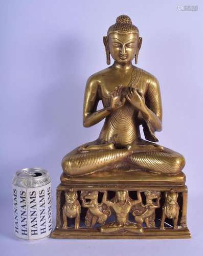 A LARGE 19TH CENTURY INDIAN BRONZE FIGURE OF A SEATED BUDDHA...