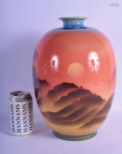 A JAPANESE CELADON SUNSET PORCELAIN VASE painted with landsc...