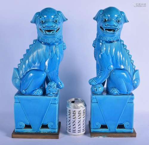 A LARGE PAIR OF 19TH CENTURY CHINESE TURQUOISE GLAZED DOGS O...