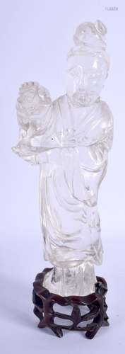 A 19TH CENTURY CHINESE CARVED ROCK CRYSTAL FIGURE OF AN IMMO...