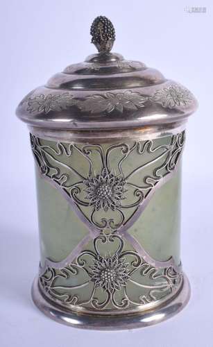 AN EARLY 20TH CENTURY CHINESE SILVER MOUNTED JADE JAR AND CO...