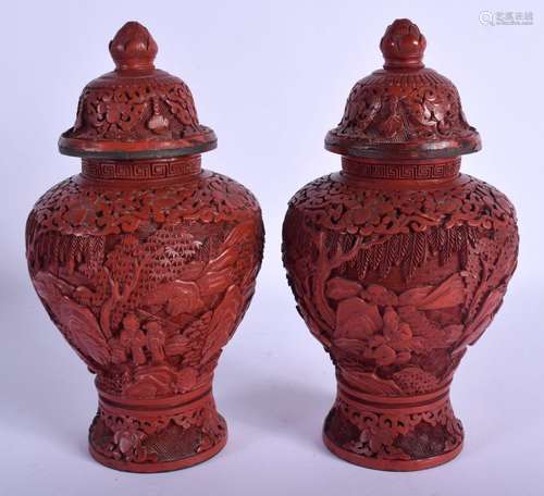 A PAIR OF 19TH CENTURY CHINESE CARVED CINNABAR LACQUER VASES...