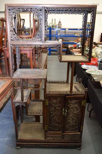 AN EARLY 20TH CENTURY CHINESE CARVED HARDWOOD DISPLAY CABINE...