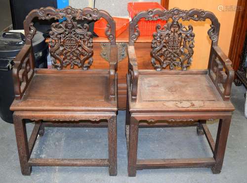 A PAIR OF 19TH CENTURY CHINESE CARVED HARDWOOD ARMCHAIRS dec...