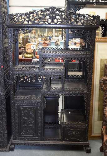 A 19TH CENTURY CHINESE CARVED HARDWOOD HONGMU DISPLAY CABINE...