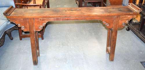A 19TH CENTURY CHINESE CARVED HARDWOOD SCROLLING ALTAR TABLE...