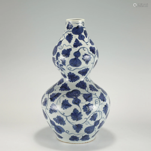 YUAN BLUE AND WHITE GOURD BOTTLE