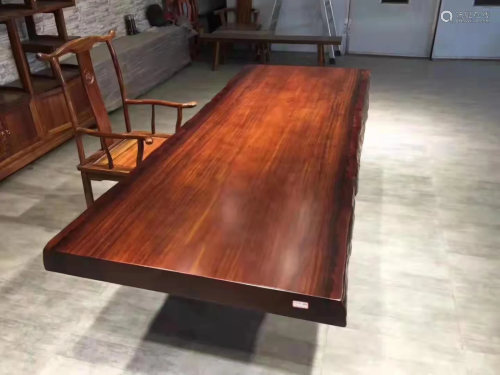 A Long Carved Wooden Table