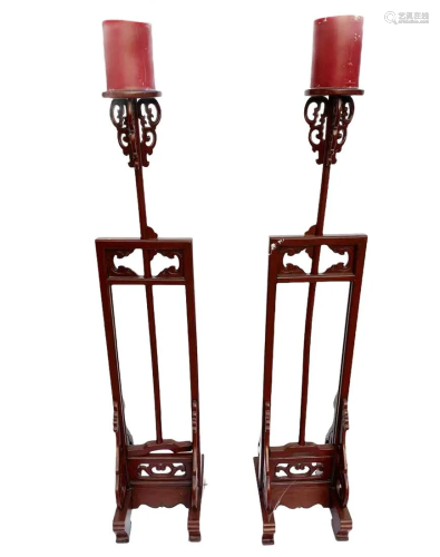 A Pair of Carved Wooden Candle Holder Stands