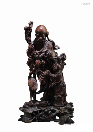 A Carved Wooden Immortal Statue