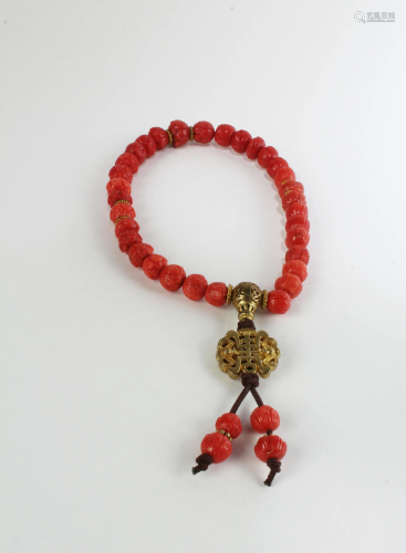 A Coral Beaded Prayer Bracelet