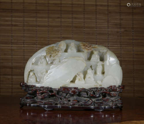 A jade figure and mountain ornament