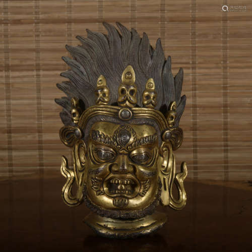 A gilt-bronze buddha head