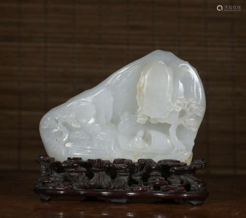 A jade figure and mountain ornament