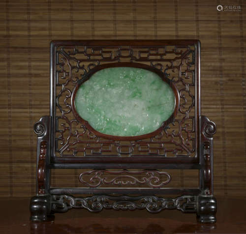 A wood screen inlaid with jade