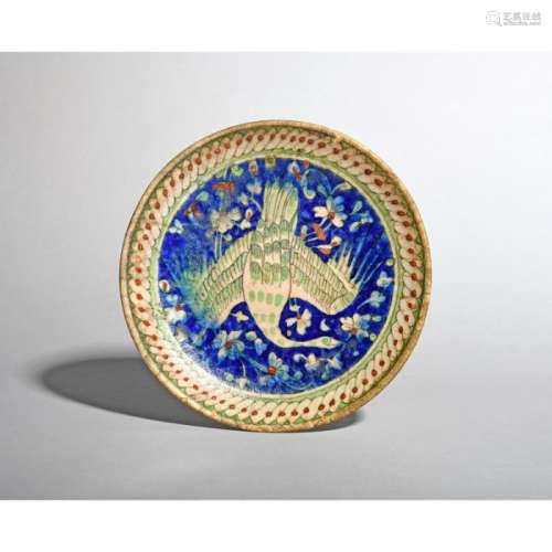 An Islamic pottery dish 19th century or earlier