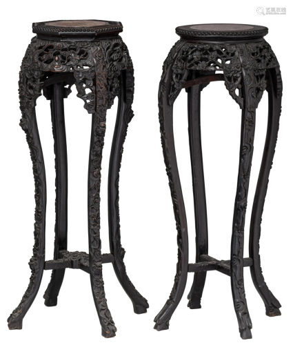 Two Chinese rosewood carved pedestal stands, with