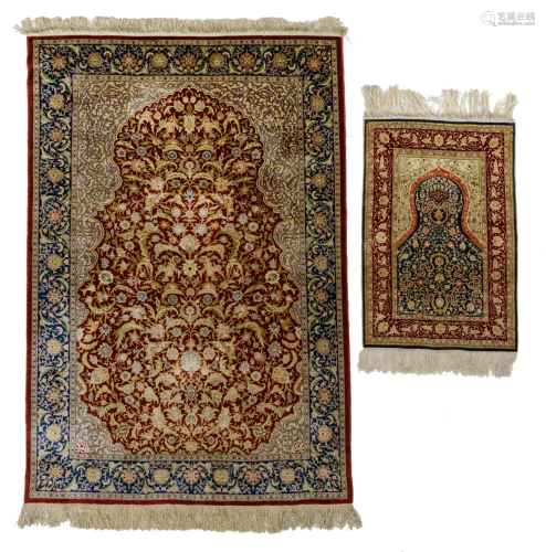 A silk Hereke rug, signed; added a ditto smaller rug,