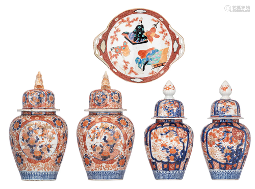 Two pairs of Japanese Imari covered jars and a