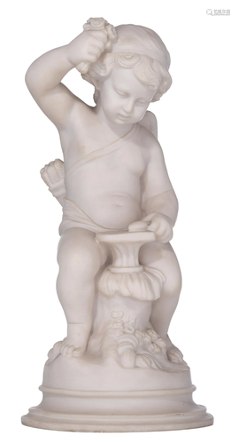 A Carrara marble figure of Cupid forging the arrow of