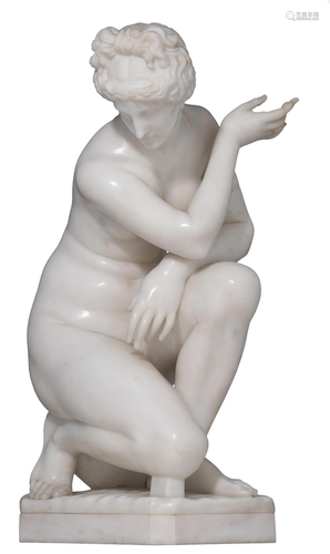 A Carrara marble figure of the crouching Aphrodite,