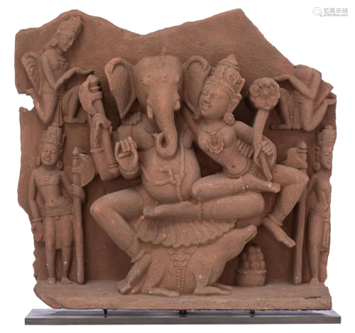 A red sandstone figure of seated Ganesha, India,