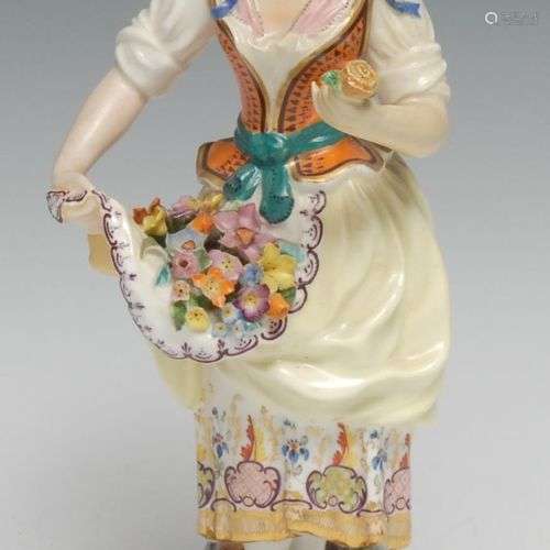 Figurine en porcelaine de Minton représentant une marchande ...