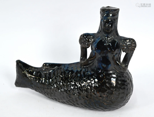 A 19th century black-glazed earthenware 'Mermaid'