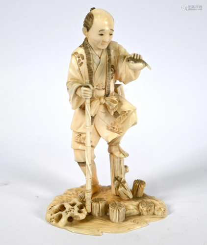 A 19th century Japanese ivory okimono of a fisherman,