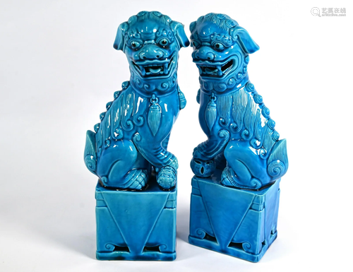 A pair of Chinese turquoise glazed guardian lions, 31